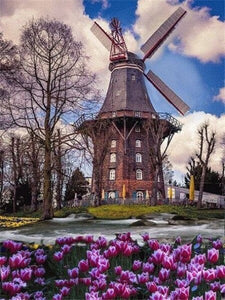 Windmill Beside Purple Flower Hill